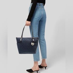 MICHAEL KORS leather trimmed black canvas tote.